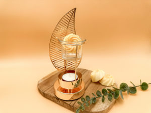 Brûle parfum décoré d'une feuille doré et d'une coupelle en céramique