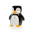 Brûle parfum pingouin en céramique noire et blanche, bec et pattes orange, ajours flocons sur le ventre, Les Fées Mères