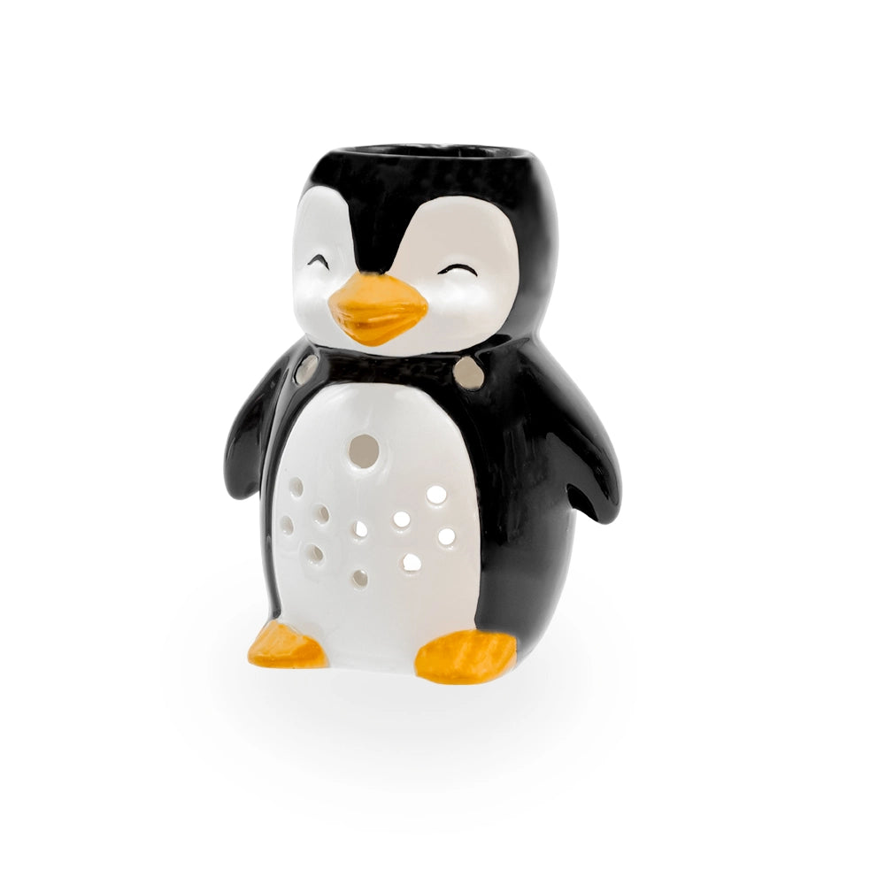 Brûle parfum pingouin en céramique noire et blanche, bec et pattes orange, ajours flocons sur le ventre, Les Fées Mères