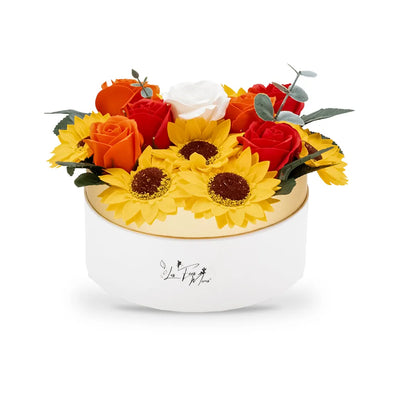 Composition en fleurs de savon tournesols et roses