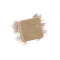 Galet de cire parfumée rocher praliné Les Fées Mères, fondant artisanal en cire végétale pour brûle-parfum, fabriqué dans les Vosges.