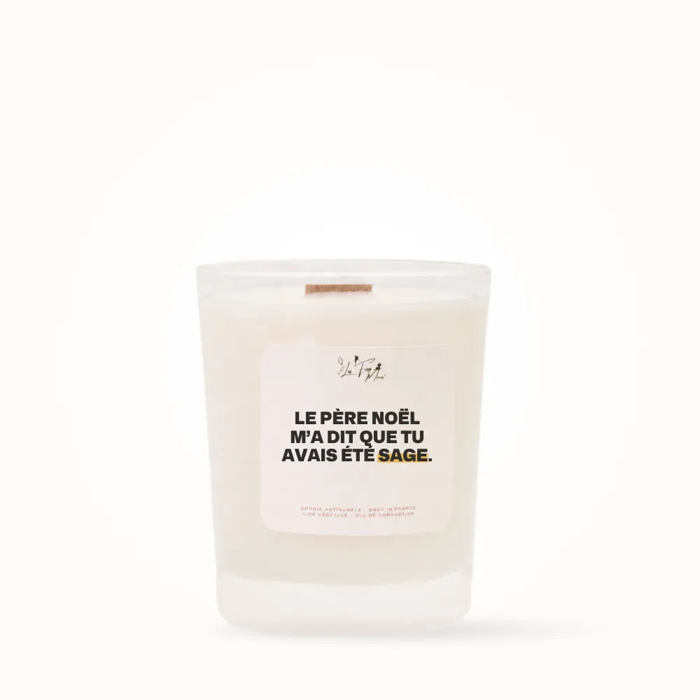 Petite bougie parfumée Les Fées Mères avec l'étiquette « Le Père Noël m'a dit que tu avais été sage », petit format 20 heures, pot en verre blanc et mèche en bois de hêtre
