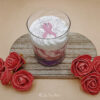 Bougie gourmande octobre rose, senteur violette et rose.