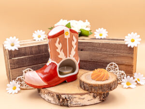 cette photo représente le brûle parfum botte de cowboy
