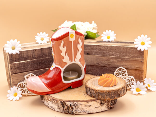 cette photo représente le brûle parfum botte de cowboy