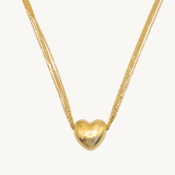 cette photo représente le collier coeur doré en acier inoxydable