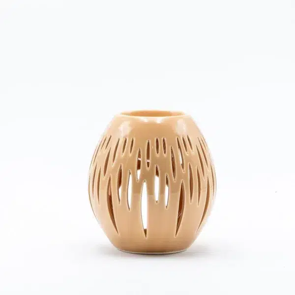 cette photo représente le brule parfum terraccota ajouré