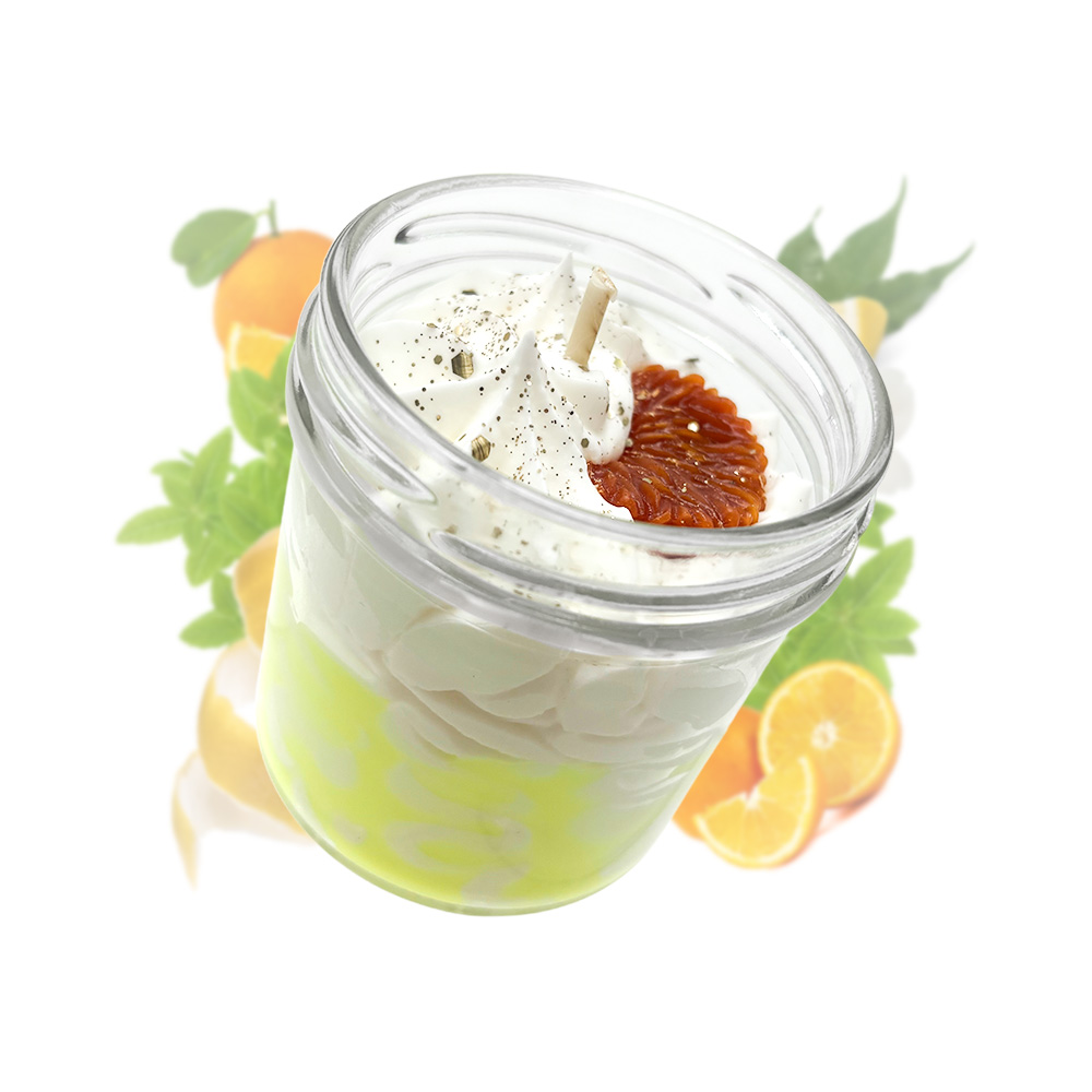 Cette photo représente la bougie gourmande agrumes artisanale, parfumée